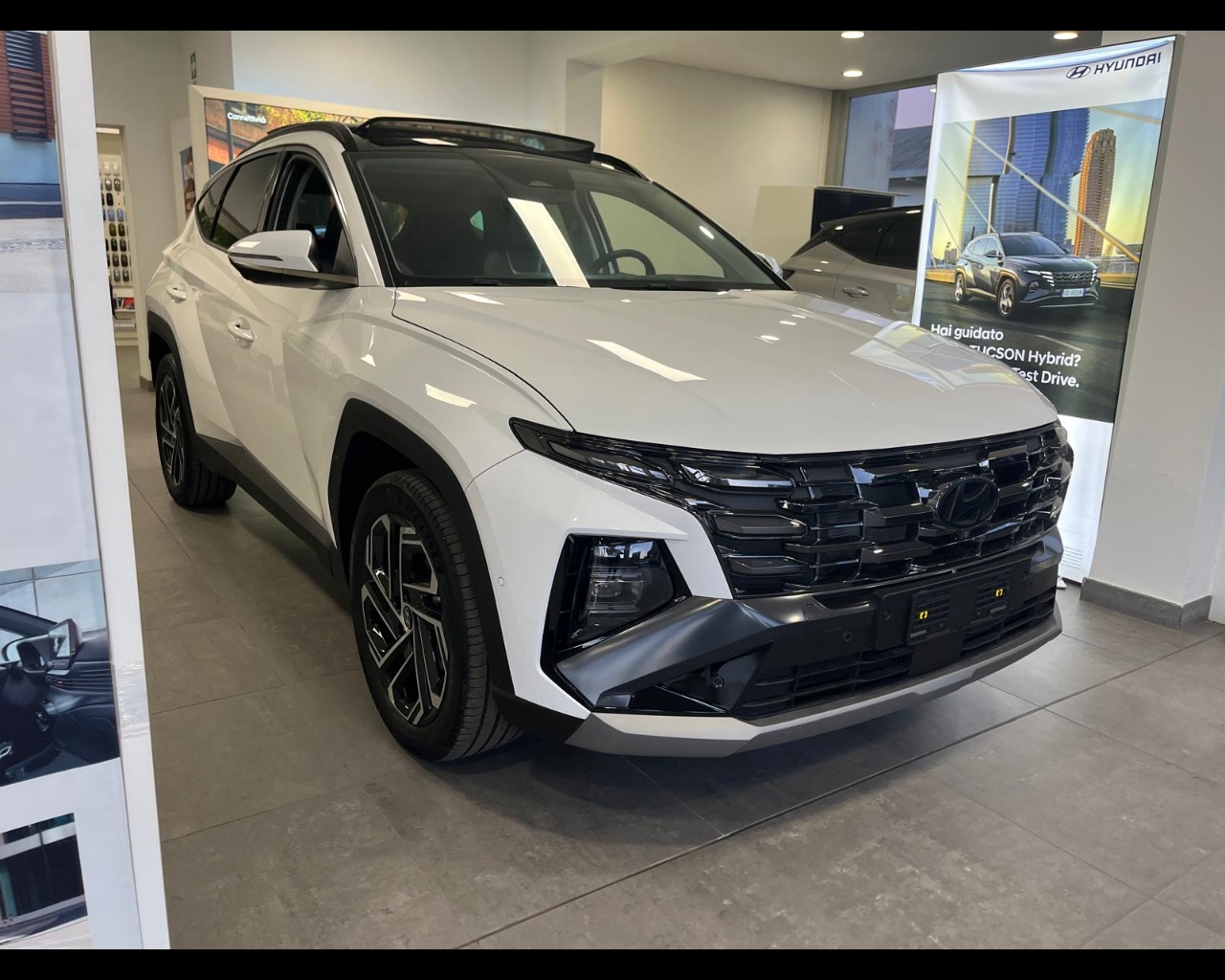 Foto HYUNDAI TUCSON PE 1.6HEV AT 2WD EXELLENCE+LP+PP