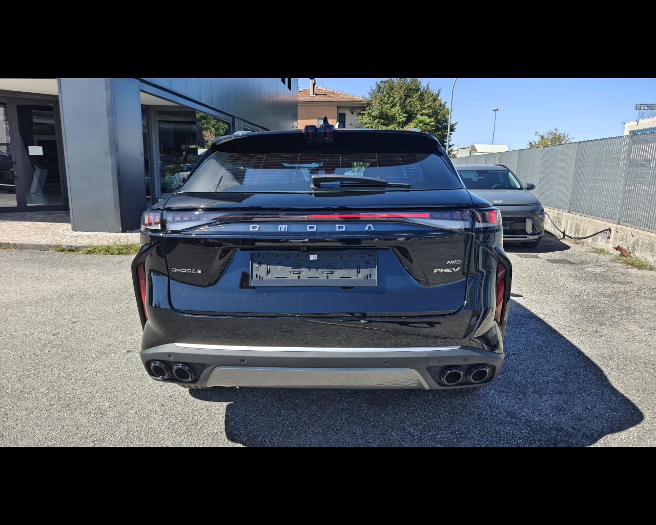 Foto OMODA OMODA 9 PHEV 1.5TGDI - Trazione AWD DHT3 Premium (AWD) - Interni Rosso